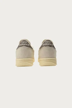 New Balance T500 - Bisque/Linen< Footwear